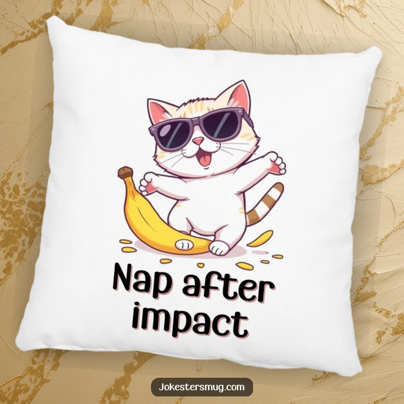 Funny cat sunglasses pillow depicting a cat in oversized shades tripping over a banana peel, body parts comically spread out.