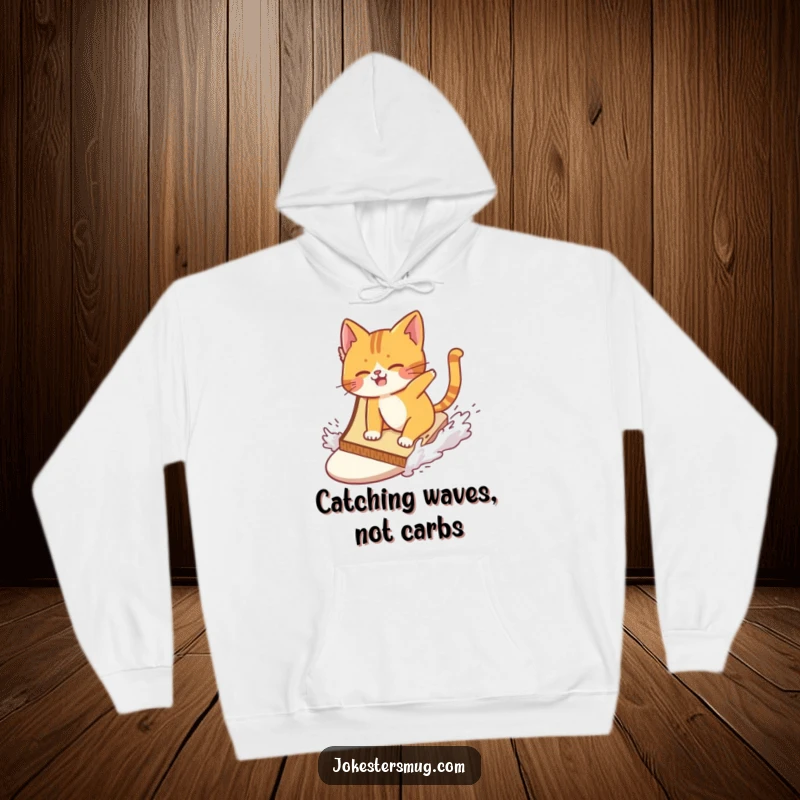 Funny cat comically wiping out while surfing a giant slice of toast on a cozy hoodie, blending warmth with hilarious action.