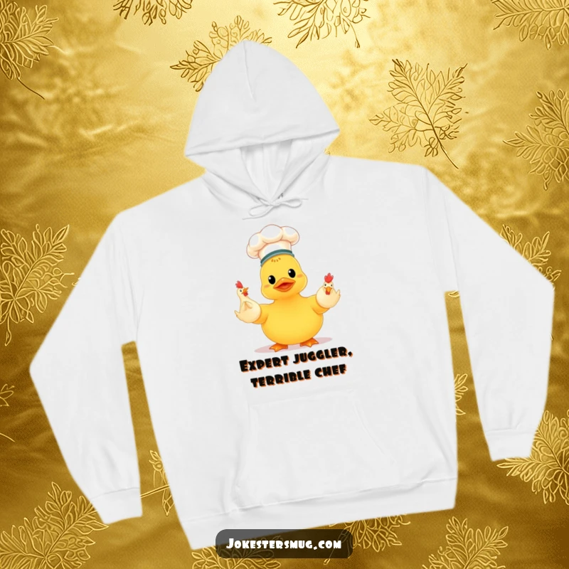 Funny chef duck in a tiny hat, chaotically juggling three rubber chickens, a warm and humorous hoodie for laughter.