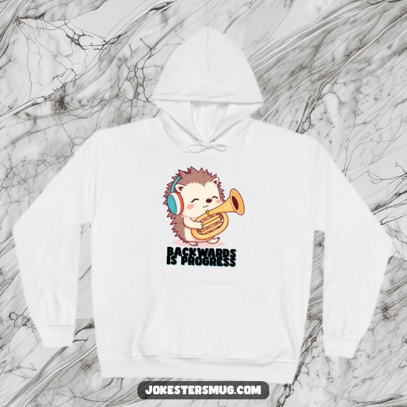 Funny hedgehog hoodie depicting a confused hedgehog with earmuffs attempting backward tuba playing, offering warmth and chuckles.
