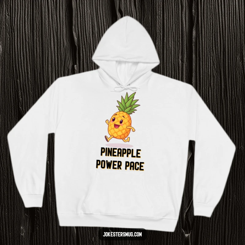 Funny hoodie with a pineapple with tiny legs humorously running a marathon, designed for cozy comfort and motivating fitness enthusiasts.