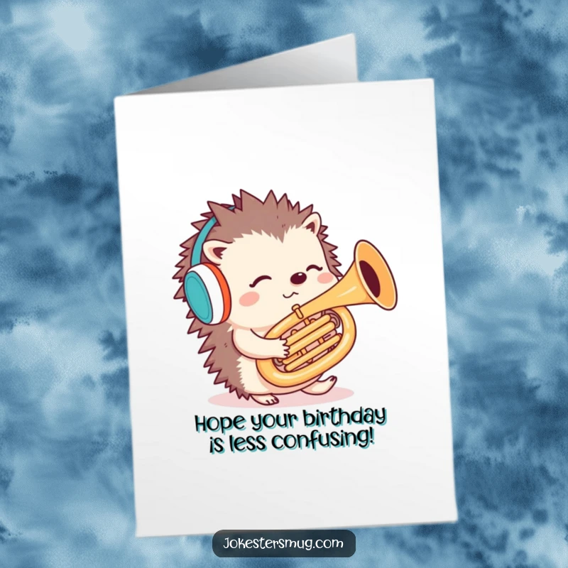 Funny Free Printable Birthday Card: A confused hedgehog wearing earmuffs, awkwardly trying to play a tuba backwards.