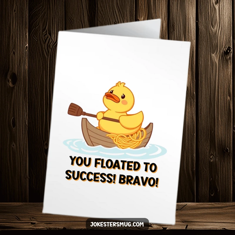 Funny Free Printable Congrats Card: A confused rubber duck paddles a bizarre boat constructed entirely from spaghetti.