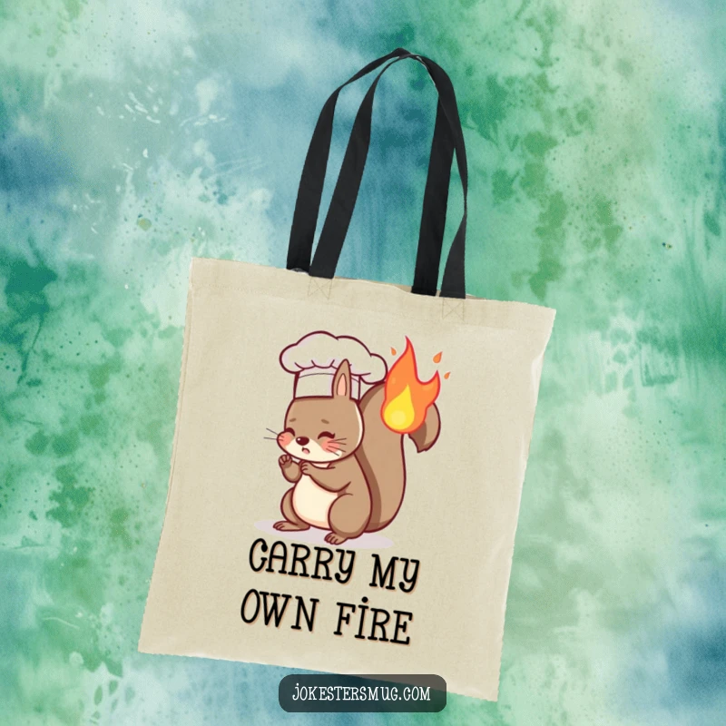 Funny tote bag with a squirrel wearing a chef hat and its tail accidentally on fire, a comical culinary mishap.