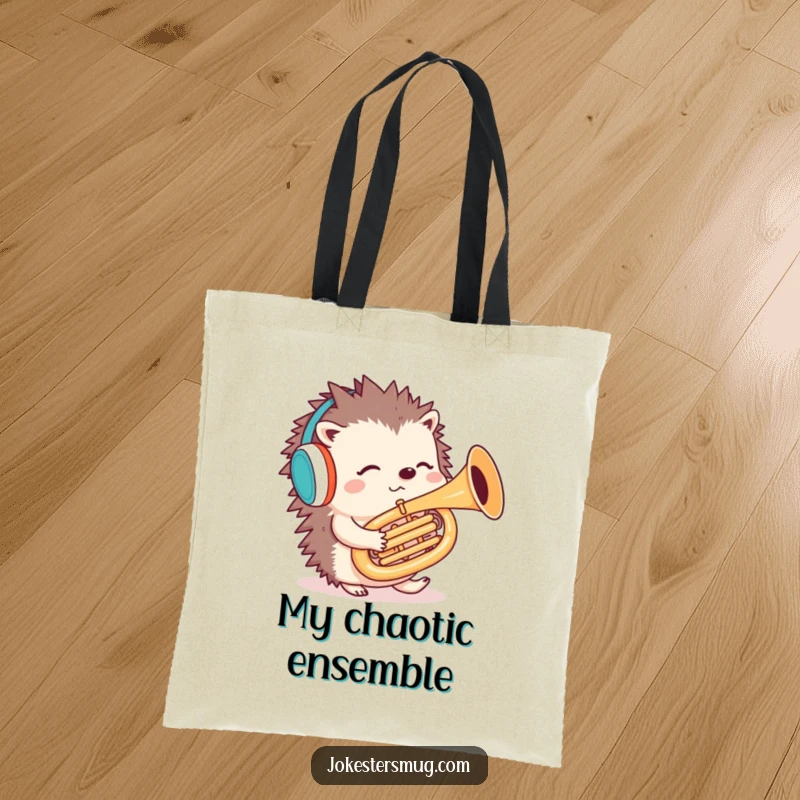 Funny hedgehog tote bag showcasing a confused hedgehog with earmuffs playing a tuba backwards, a functional and humorous accessory.