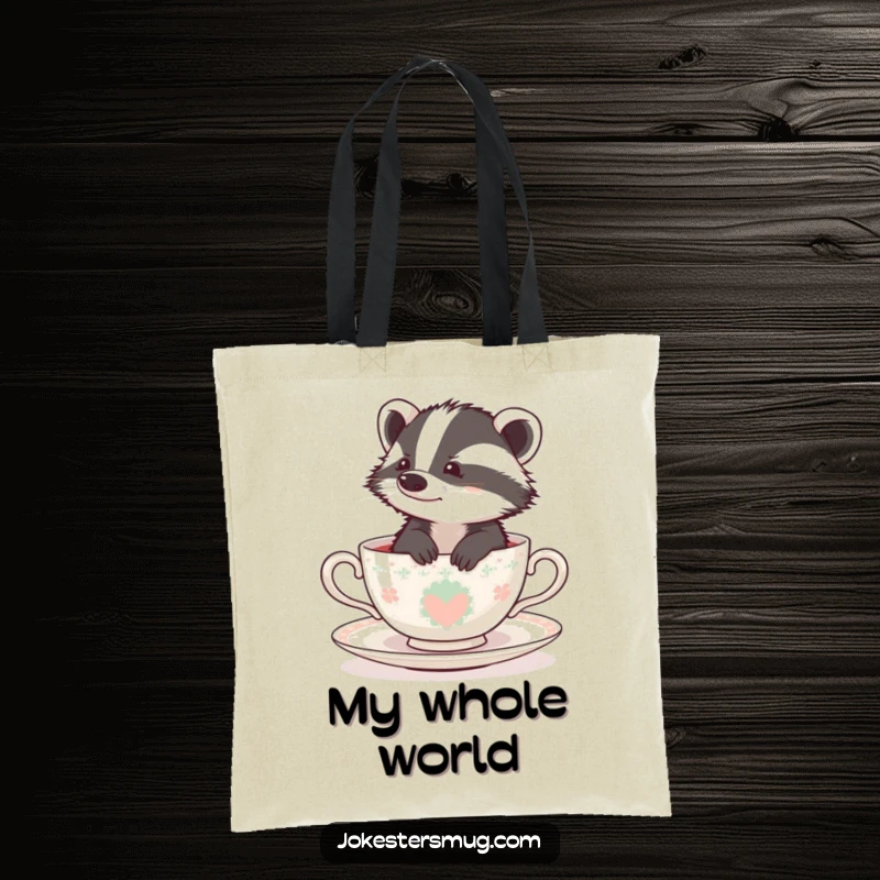 Funny badger stuck in a small teacup, looking lost, illustrated on a stylish and humorous tote bag.
