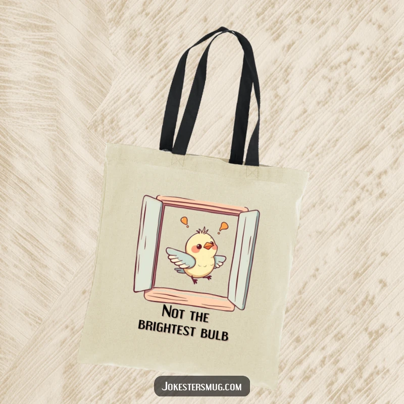 Funny tote bag showcasing a bird hilariously misunderstanding a painted window, bumping its beak in a comical scene.